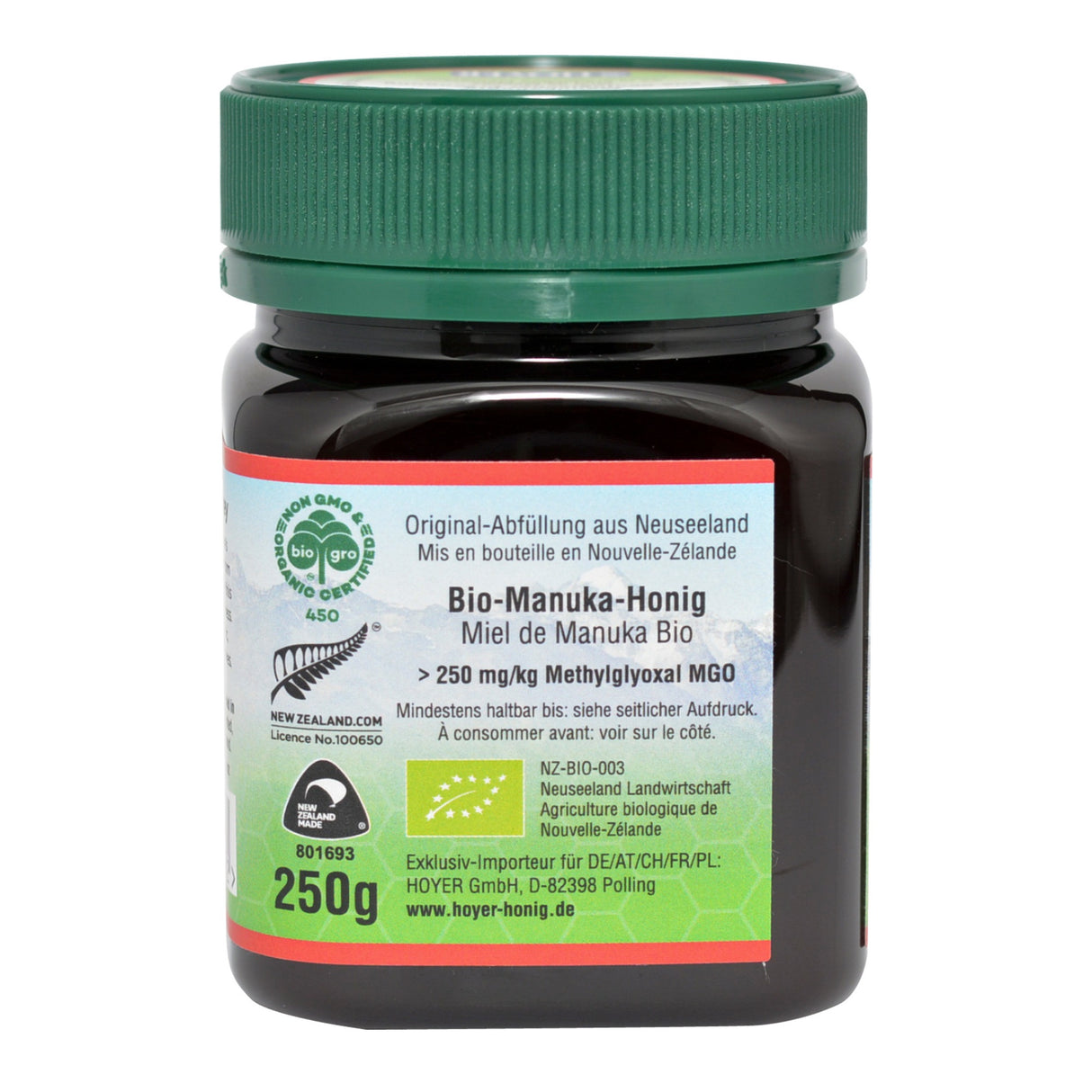 Ein Glas Bio-Manuka-Honig mit grünem Deckel und Etikett. Herkunft Neuseeland, 250g, MGO >250 mg/kg. Importiert von Hoyer GmbH.