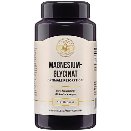Das Bild zeigt eine dunkelviolette Flasche mit einem weißen Etikett, auf dem "Magnesiumglycinat" steht. Es handelt sich um ein Nahrungsergänzungsmittel mit 180 Kapseln. Auf dem Etikett sind die Worte "Optimale Resorption", "ohne Gentechnik", "Glutenfrei" und "Vegan" zu sehen. Oben auf dem Etikett steht "I like it clean for my health". Die Flasche hat einen schwarzen Deckel.
