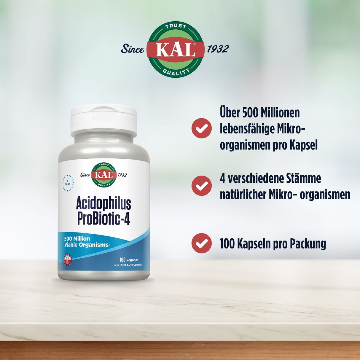 KAL Probiotikum-Flasche mit 500 Mio. Mikroorganismen pro Kapsel, 4 Stämme, 100 Kapseln. Auf weißem Tisch, Hintergrund unscharf.