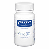 Das Bild zeigt eine weiße Kunststoffflasche mit Schraubverschluss. Auf dem Etikett steht 'pure encapsulations Zink 30 Zinkpicolinat'. Die Flasche ist weiß mit blauer und schwarzer Schrift. Sie enthält Nahrungsergänzungsmittel.