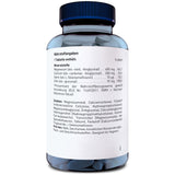 Eine Flasche mit Nahrungsergänzungsmitteln, die detaillierte Nährwertangaben und Zutaten auf dem Etikett zeigt. Die Flasche hat einen blauen Deckel und enthält Tabletten. Auf dem Etikett sind Mineralstoffe wie Magnesium, Calcium, Selen und Zink aufgeführt, zusammen mit deren Mengen und Prozentwerten des Nährstoffbezugswertes. Die Zutatenliste enthält Magnesiumoxid, Calciumcarbonat und weitere Inhaltsstoffe. Das Produkt ist frei von Hefe und künstlichen Konservierungsmitteln und für Veganer geeignet.