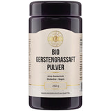 Ein schwarzes Kunststoffbehälter mit einem weißen Etikett, das "Bio Gerstengrassaft Pulver" in schwarzer Schrift zeigt. Das Etikett enthält auch Informationen wie "ohne Gentechnik", "Glutenfrei", "Vegan" und "250 g". Oben auf dem Etikett befindet sich ein goldfarbenes Logo mit der Aufschrift "I LIKE IT CLEAN FOR MY HEALTH". Der Behälter ist zylindrisch und hat einen Deckel. Es handelt sich um ein Nahrungsergänzungsmittel.