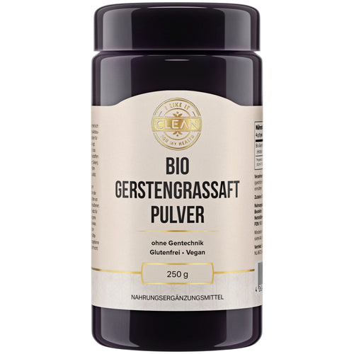 Ein schwarzes Kunststoffbehälter mit einem weißen Etikett, das "Bio Gerstengrassaft Pulver" in schwarzer Schrift zeigt. Das Etikett enthält auch Informationen wie "ohne Gentechnik", "Glutenfrei", "Vegan" und "250 g". Oben auf dem Etikett befindet sich ein goldfarbenes Logo mit der Aufschrift "I LIKE IT CLEAN FOR MY HEALTH". Der Behälter ist zylindrisch und hat einen Deckel. Es handelt sich um ein Nahrungsergänzungsmittel.