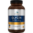 Eine weiße Plastikflasche mit einem Etikett, das Nährstoffangaben und Produktinformationen für Glycin-Kapseln zeigt. Die Flasche enthält 90 vegetarische Kapseln mit je 500 mg Glycin. Auf dem Etikett sind Herstellerinformationen und ein Mindesthaltbarkeitsdatum angegeben.