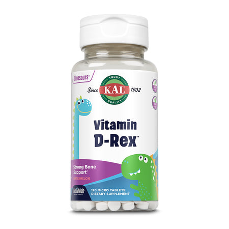 Eine Flasche mit Nahrungsergänzungsmitteln namens "Vitamin D-Rex" von der Marke KAL. Auf dem Etikett sind zwei cartoonartige Dinosaurier abgebildet, einer blau und einer grün. Die Flasche enthält 120 Mikrotabletten mit Wassermelonengeschmack zur Unterstützung der Knochengesundheit. Das Etikett weist auch auf die "ActivMelt"-Technologie hin.