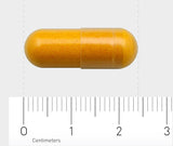 Das Bild zeigt eine gelbe Kapsel, die auf einem Lineal liegt. Die Kapsel ist zylindrisch geformt und etwa 2 Zentimeter lang. Das Lineal unter der Kapsel zeigt Zentimeter- und Millimetermarkierungen. Der Hintergrund ist neutral und hell, was die Kapsel hervorhebt.