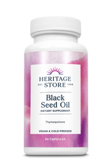 Eine weiße Plastikflasche mit einem rosa Etikett. Auf dem Etikett steht 'Heritage Store Black Seed Oil Dietary Supplement'.