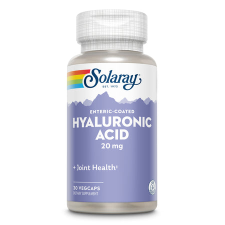Eine Flasche Solaray Hyaluronic Acid mit 20 mg Kapseln. Die Flasche hat ein Etikett mit einem Regenbogen-Logo und den Texten "Enteric-Coated", "Joint Health" und "30 Vegcaps". Der Hintergrund des Etiketts ist lila mit einem Bergmotiv.