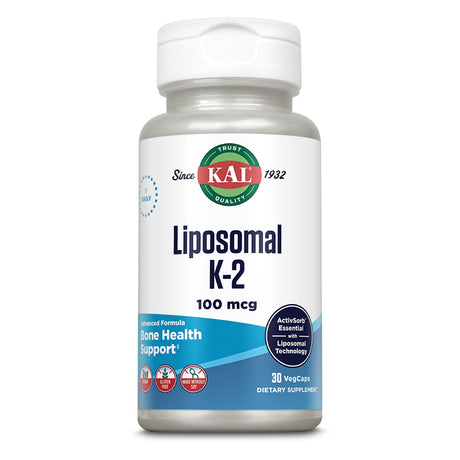 Eine Flasche mit Nahrungsergänzungsmittel der Marke KAL. Auf dem Etikett steht 'Liposomal K-2, 100 mcg'. Die Flasche enthält 30 VegCaps und ist glutenfrei sowie sojafrei. Sie unterstützt die Knochengesundheit mit Liposomentechnologie.