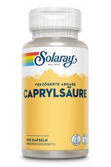 Eine Frau in Sportkleidung dehnt sich auf einer Gymnastikmatte. Daneben eine Flasche Solaray Caprylsäure Nahrungsergänzungsmittel. Der Text beschreibt die Eigenschaften des Produkts.