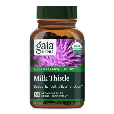 Eine braune Plastikflasche mit grünem Deckel, etikettiert mit 'Gaia Herbs', enthält 60 vegane Kapseln 'Milk Thistle' zur Unterstützung der Lebergesundheit. Auf dem Etikett ist eine lila Mariendistel abgebildet. Das Produkt ist USDA-zertifiziert und organisch.