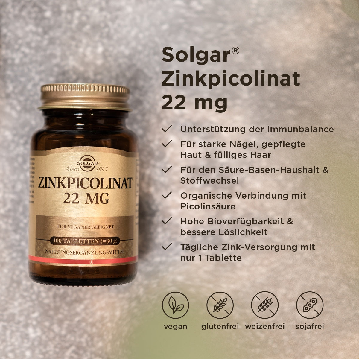 Ein Glasbehälter mit der Aufschrift 'Solgar Zinkpicolinat 22 mg' steht auf einer Oberfläche. Neben dem Behälter sind Textinformationen aufgelistet, die die Vorteile des Produkts beschreiben, wie Unterstützung der Immunbalance, starke Nägel, gepflegte Haut und volles Haar. Unten sind Symbole für vegan, glutenfrei, weizenfrei und sojafrei.