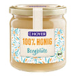Glas mit Hoyer 100% Honig Bergblüte, Bio-Qualität, florales Etikettendesign.