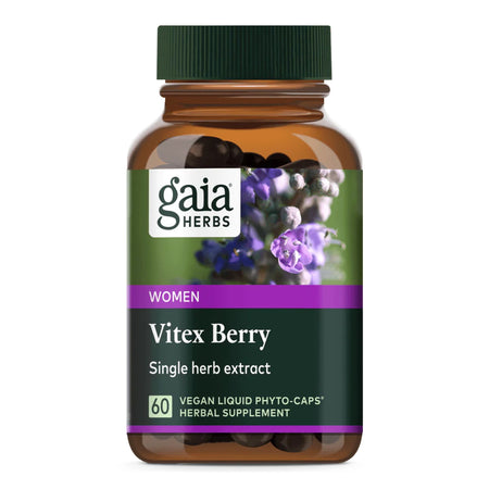Das Bild zeigt eine braune Flasche mit einem grünen Deckel, die ein Nahrungsergänzungsmittel von Gaia Herbs enthält. Auf dem Etikett steht 'Women Vitex Berry Single herb extract'. Es zeigt ein Bild von lila Blüten. Das Produkt enthält 60 vegane Flüssigkapseln.
