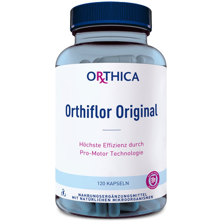 Das Bild zeigt eine blaue Flasche mit einem schwarzen Deckel, die ein Nahrungsergänzungsmittel enthält. Auf dem Etikett steht "Orthica Orthiflor Original". Darunter sind die Worte "Höchste Effizienz durch Pro-Motor Technologie" zu lesen. Die Flasche enthält 120 Kapseln mit natürlichen Mikroorganismen.