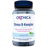 Eine Flasche mit der Aufschrift 'ORTHICA Stress B-Komplex' ist zu sehen. Die Flasche enthält 90 Tabletten und ist als Nahrungsergänzungsmittel mit B-Vitaminen gekennzeichnet. Ein grünes Symbol zeigt, dass das Produkt vegan ist.