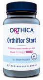 Das Bild zeigt eine blaue Plastikflasche mit einem schwarzen Deckel. Auf dem Etikett steht 'Orthica Orthiflor Start', ein Probiotikum für Mutter und Kind. Es enthält Ecologic Panda und ist vegetarisch. Das Gewicht beträgt 42 Gramm.
