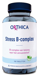Das Bild zeigt eine Flasche mit Nahrungsergänzungsmitteln der Marke Orthica. Auf dem Etikett steht 'Stress B-complex', ein B-Vitamin-Komplex für das Nervensystem. Die Flasche enthält 180 Tabletten und ist vegan. Der Hintergrund ist neutral.