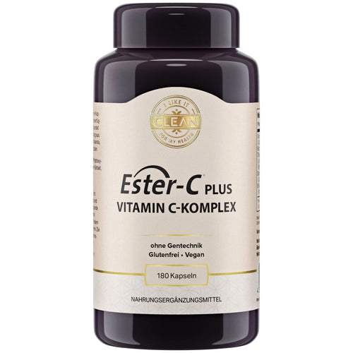 Eine schwarze Plastikflasche mit einem Etikett, das "Ester-C Plus Vitamin C-Komplex" zeigt. Es ist ein Nahrungsergänzungsmittel, das glutenfrei, vegan und ohne Gentechnik ist. Die Flasche enthält 180 Kapseln.