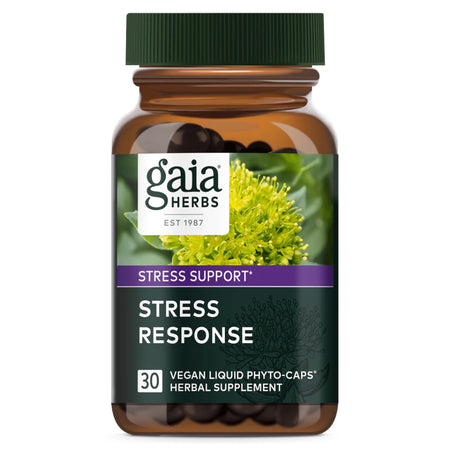 Das Bild zeigt eine braune Plastikflasche mit dem Etikett 'Gaia Herbs Stress Response'. Auf dem Etikett sind grüne Pflanzen abgebildet. Die Flasche enthält 30 vegane flüssige Phytokapseln als Nahrungsergänzungsmittel zur Stressunterstützung.
