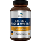 Eine weiße Plastikflasche mit einem Etikett, das Informationen über Nahrungsergänzungsmittel enthält. Das Etikett beschreibt die Inhaltsstoffe und Nährwerte der Kapseln, die Kalium und Magnesium enthalten. Die Flasche hat einen weißen Schraubverschluss und ist auf einem weißen Hintergrund platziert. Auf dem Etikett sind auch Angaben zum Hersteller und zur Haltbarkeit zu sehen.