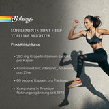 Werbung für Solaray-Nahrungsergänzungsmittel mit Frau in Sportkleidung. Enthält Grapefruitsamen-Extrakt, Vitamine C, E, Zink. 60 vegane Kapseln.