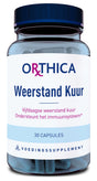 Das Bild zeigt eine Flasche mit einem Nahrungsergänzungsmittel namens 'Orthica Weerstand Kuur'. Die Flasche ist blau mit einem weißen Etikett. Auf dem Etikett steht: 'Vijfdaagse weerstand kuur, Ondersteunt het immuunsysteem', '30 Capsules', 'Voedingssupplement'. Die Kapseln sind blau und in der Flasche sichtbar.