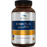 Eine weiße Plastikflasche mit einem Etikett, das die Nährstoffangaben eines Vitamin-C-Präparats zeigt. Die Flasche ist von hinten fotografiert, sodass der Text auf dem Etikett gut lesbar ist. Es sind Details zu den Inhaltsstoffen und der Haltbarkeit abgebildet.