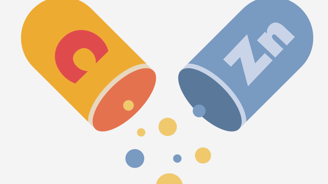 schematische Zeichnung einer geöffneten Kapsel, die Vitamin C und Zink enthält.