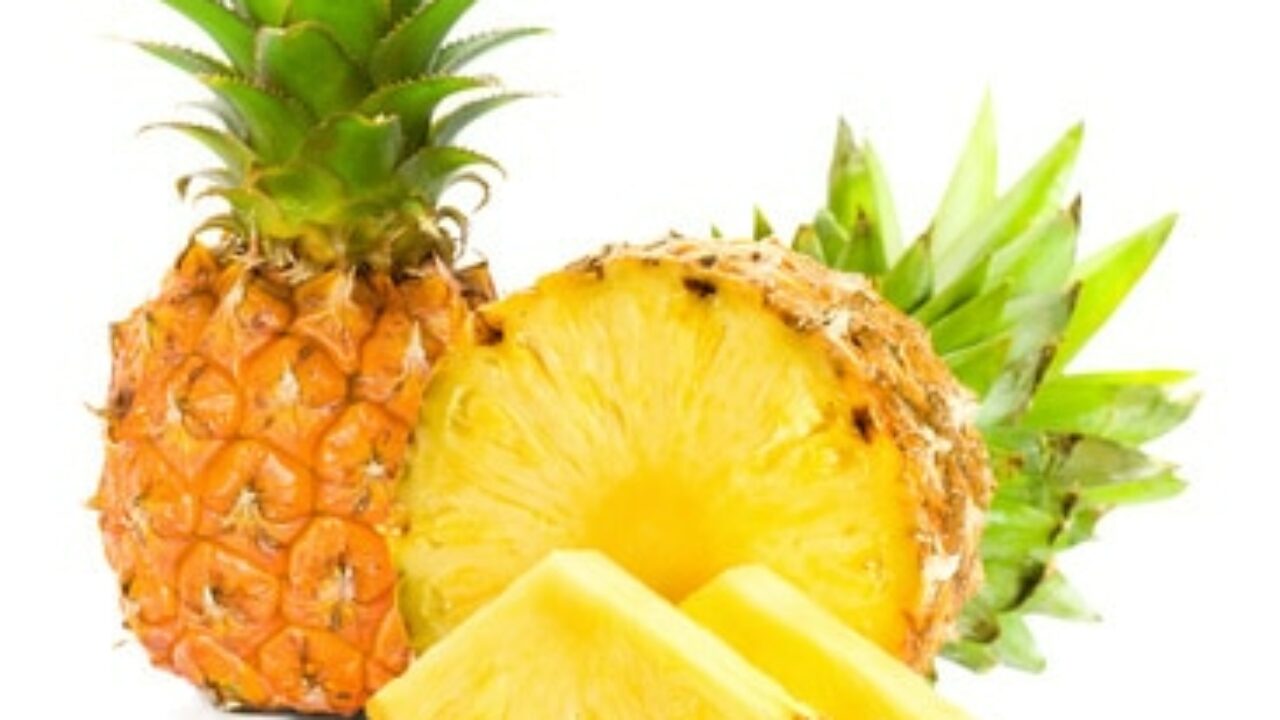 Fresh slice pineapple on white background